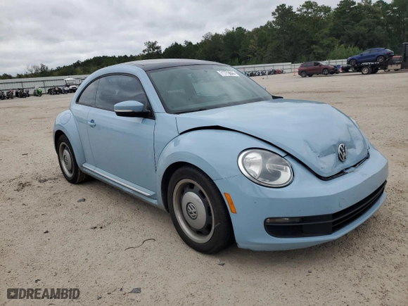 2012 Volkswagen Beetle 2.5L with VIN 3VWJX7ATXCM652978, listed as a Copart auction lot 71779644 with 170,083 mi miles and Salvage Title. Bid and sale history available at carsss.com. Image 4.