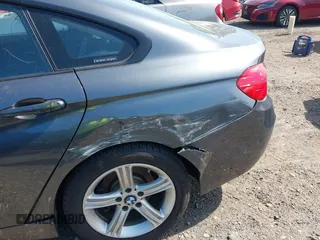 2015 BMW 4 Series 428i xDrive with VIN WBA4C9C55FD331921, listed as a IAAI auction lot 42214901 with 94,970 mi miles and . Bid and sale history available at DreamBid. Image 12.