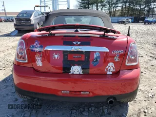 2012 MINI Roadster z VIN WMWSY1C59CT311571, wystawiony jako Copart lot #46381264 z przebiegiem 60 694 mil mil oraz Szkody całkowita. Historia ofert i sprzedaży dostępna na DreamBid. Obrazek 6.