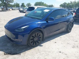 2023 Tesla Model Y Performance with VIN 7SAYGDEF9PF582908, listed as a IAAI auction lot 41930957 with 52,857 mi miles and . Bid and sale history available at DreamBid. Image 16.