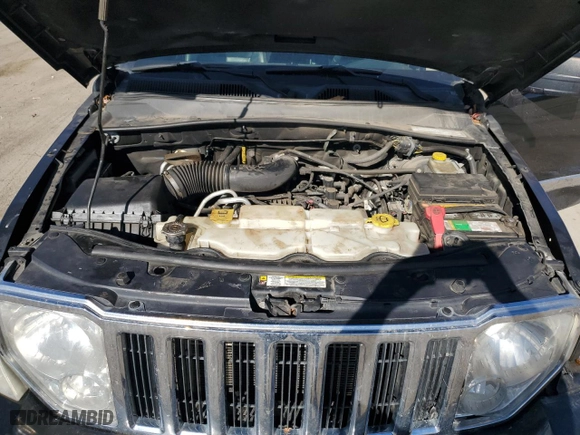 2009 Jeep Liberty Limited with VIN 1J8GN58K79W552651, listed as a Copart auction lot 77890874 with 140,342 mi miles and Salvage Title. Bid and sale history available at carsss.com. Image 12.