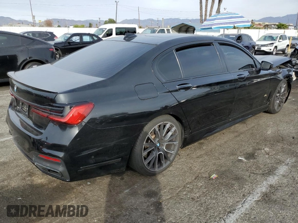 2021 BMW 7 Series 740i with VIN WBA7T2C01MCF51202, listed as a Copart auction lot 84522934 with Not provided miles and Salvage title. Bid and sale history available at DreamBid. Image 3.