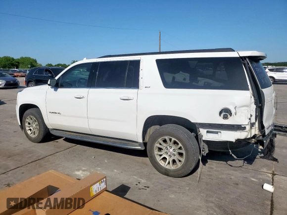 2019 GMC Yukon XL SLT with VIN 1GKS2GKC5KR363643, listed as a Copart auction lot 52749525 with 92,872 mi miles and Salvage title. Bid and sale history available at DreamBid. Image 2.