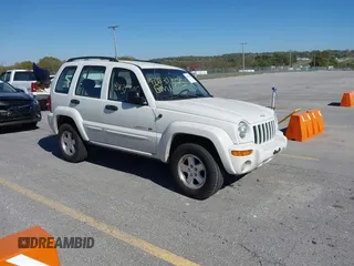 2002 Jeep Liberty Limited with VIN 1J4GK58K12W303195, listed as a IAAI auction lot 40631305 with 73,129 mi miles and . Bid and sale history available at DreamBid. Image 1.