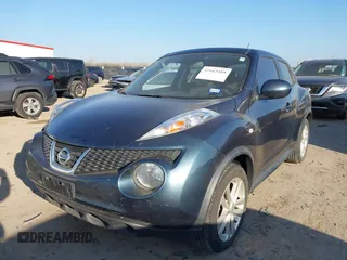 2014 Nissan Juke S with VIN JN8AF5MR1ET354919, listed as a IAAI auction lot 41663488 with 121,694 mi miles. Bid and sale history available at carsss.com. Image 2.