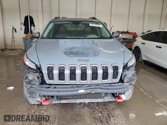 2014 Jeep Cherokee Trailhawk z VIN 1C4PJMBB0EW309277, wystawiony jako Copart lot #52370565 z przebiegiem 148 924 mil mil oraz Czysty tytuł • Clean title. Historia ofert i sprzedaży dostępna na DreamBid. Obrazek 5.