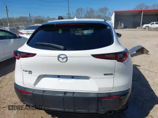 2022 Mazda CX-30 S Premium with VIN 3MVDMBDL1NM413540, listed as a IAAI auction lot 41681191 with 57,764 mi miles and . Bid and sale history available at carsss.com. Image 17.