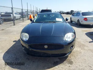 2009 Jaguar XK with VIN SAJWA43B295B31026, listed as a IAAI auction lot 41950751 with 110,331 mi miles. Bid and sale history available at carsss.com. Image 12.