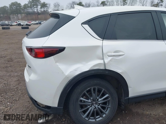 2021 Mazda CX-5 Touring with VIN JM3KFBCM1M1446313, listed as a IAAI auction lot 41930330 with 28,610 mi miles. Bid and sale history available at carsss.com. Image 6.