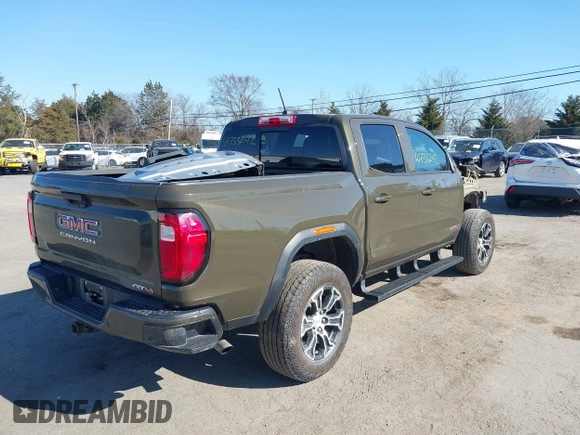 2023 GMC Canyon 4WD AT4 with VIN 1GTP6DEK1P1174713, listed as a IAAI auction lot 41733242 with 35,705 mi miles. Bid and sale history available at carsss.com. Image 4.