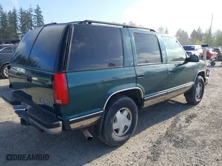 1998 Chevrolet Tahoe with VIN 1GNEK13R9WJ365044, listed as a IAAI auction lot 42042506 with 187,987 mi miles. Bid and sale history available at carsss.com. Image 4.