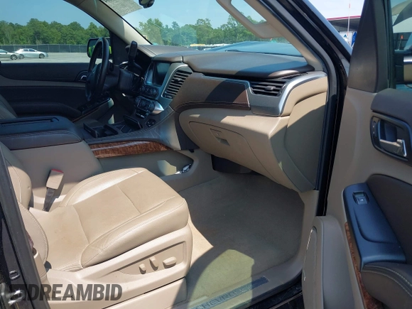 2019 Chevrolet Suburban LT with VIN 1GNSCJKC5KR304766, listed as a IAAI auction lot 42410264 with 105,171 mi miles and . Bid and sale history available at DreamBid. Image 5.