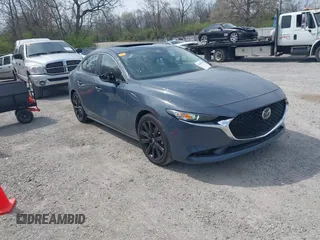 2024 Mazda 3 S Carbon Edition with VIN 3MZBPBCM3RM416565, listed as a IAAI auction lot 42047841 with 11,074 mi miles and . Bid and sale history available at DreamBid. Image 1.