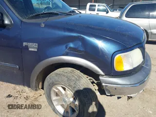 2003 Ford F-150 XL with VIN 1FTRX18L73NB36799, listed as a IAAI auction lot 41317602 with 270,075 mi miles. Bid and sale history available at carsss.com. Image 15.