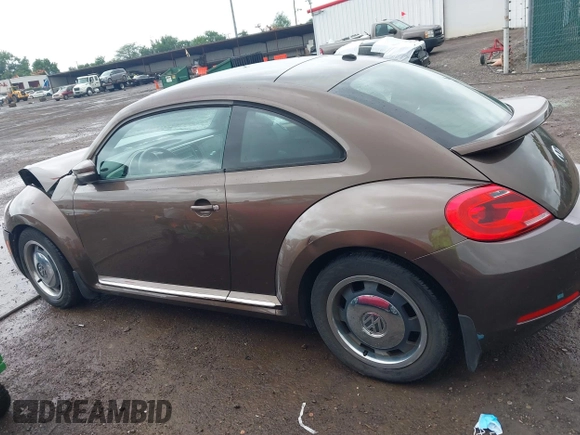 2012 Volkswagen Beetle 2.5L PZEV with VIN 3VWJP7AT2CM638265, listed as a IAAI auction lot 42512449 with 137,129 mi miles and . Bid and sale history available at DreamBid. Image 14.
