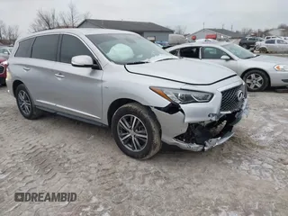 2020 Infiniti QX60 LUXE with VIN 5N1DL0MMXLC523787, listed as a IAAI auction lot 41232779 with 125,318 mi miles. Bid and sale history available at carsss.com. Image 1.