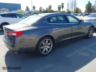 2015 Maserati Quattroporte S Q4 with VIN ZAM56RRA8F1134208, listed as a IAAI auction lot 41857398 with 105,151 mi miles. Bid and sale history available at carsss.com. Image 4.
