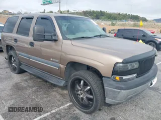 2003 Chevrolet Tahoe LS z VIN 1GNEC13Z53R162176, wystawiony jako IAAI lot #41772778 z przebiegiem Nie podano mil oraz . Historia ofert i sprzedaży dostępna na DreamBid. Obrazek 1.