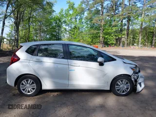 2015 Honda Fit LX with VIN 3HGGK5H50FM772396, listed as a IAAI auction lot 42112723 with 125,419 mi miles and . Bid and sale history available at carsss.com. Image 13.