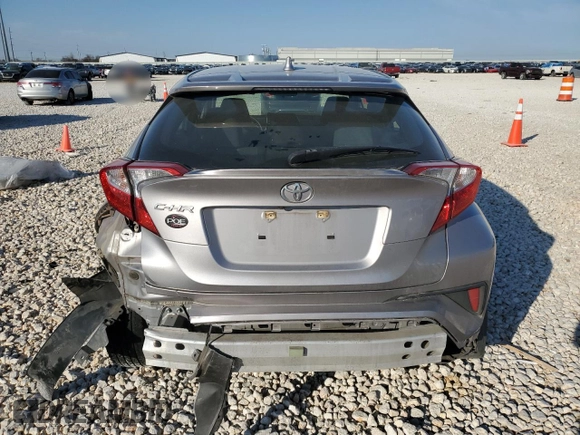 2020 Toyota C-HR LE with VIN JTNKHMBX8L1088373, listed as a Copart auction lot 47241005 with 85,300 mi miles and Salvage Title. Bid and sale history available at DreamBid. Image 6.