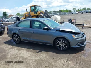 2016 Volkswagen Jetta Sport z VIN 3VWD17AJ9GM376294, wystawiony jako IAAI lot #42141450 z przebiegiem 139 030 mil mil oraz . Historia ofert i sprzedaży dostępna na DreamBid. Obrazek 14.