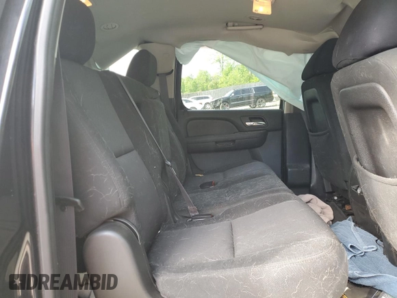 2011 Chevrolet Suburban LS with VIN 1GNWKLEG2BR389659, listed as a Copart auction lot 54923925 with 151,879 mi miles and Salvage title. Bid and sale history available at DreamBid. Image 11.