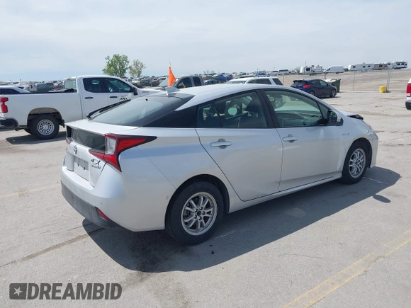 2020 Toyota Prius L Eco with VIN JTDKARFU5L3117287, listed as a IAAI auction lot 42202426 with 122,870 mi miles and . Bid and sale history available at DreamBid. Image 4.