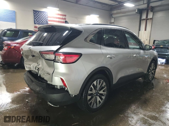 2020 Ford Escape Titanium Hybrid z VIN 1FMCU9DZ6LUB39475, wystawiony jako Copart lot #50159215 z przebiegiem 76 496 mil mil oraz Szkoda całkowita • Salvage title. Historia ofert i sprzedaży dostępna na DreamBid. Obrazek 3.