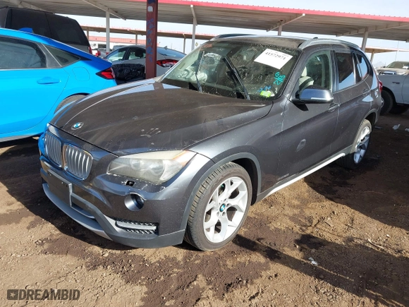 2013 BMW X1 28i with VIN WBAVM1C57DVW42096, listed as a IAAI auction lot 41572971 with 156,999 mi miles. Bid and sale history available at carsss.com. Image 16.