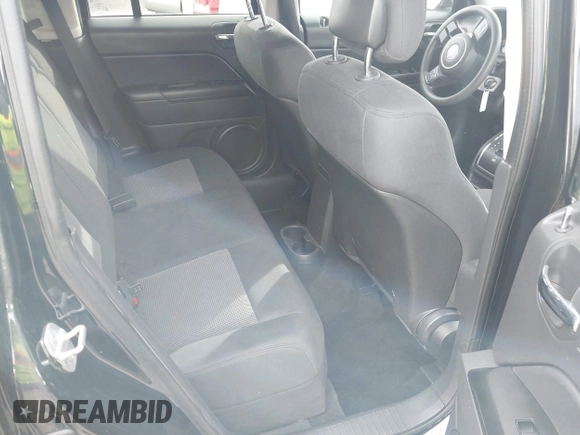 2013 Jeep Patriot Sport with VIN 1C4NJPBA3DD237887, listed as a IAAI auction lot 41599995 with 144,673 mi miles and . Bid and sale history available at DreamBid. Image 8.