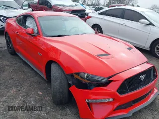 2021 Ford Mustang GT with VIN 1FA6P8CF4M5119074, listed as a IAAI auction lot 41137351 with 28,718 mi miles. Bid and sale history available at carsss.com. Image 1.