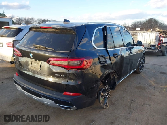 2021 BMW X5 xDrive40i with VIN 5UXCR6C08M9D76272, listed as a IAAI auction lot 41219782 with 56,599 mi miles and . Bid and sale history available at DreamBid. Image 4.