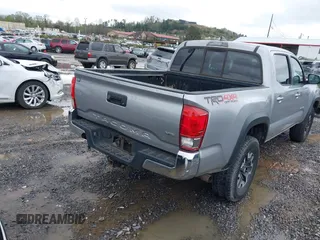 2016 Toyota Tacoma SR with VIN 5TFCZ5AN5GX026458, listed as a IAAI auction lot 41975246 with 208,401 mi miles and . Bid and sale history available at DreamBid. Image 4.