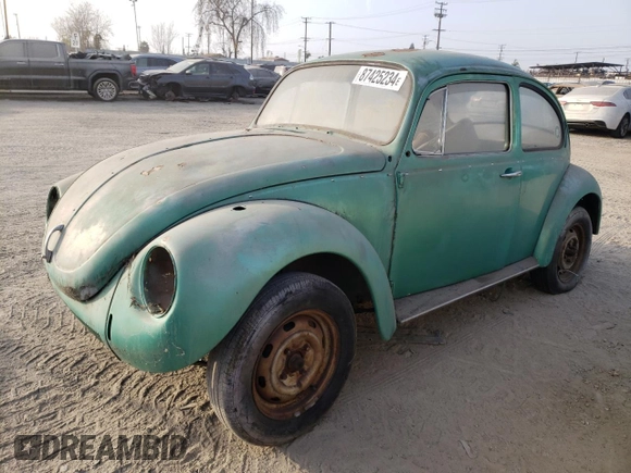 1971 Volkswagen Beetle with VIN 1112643210, listed as a Copart auction lot 87425234 with Not Provided miles and Salvage Title. Bid and sale history available at DreamBid. Image 1.
