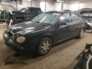 2001 Kia Spectra GS with VIN KNAFB161715023044, listed as a Copart auction lot 85756304 with 161,504 mi miles and Salvage Title. Bid and sale history available at carsss.com. Image 1.