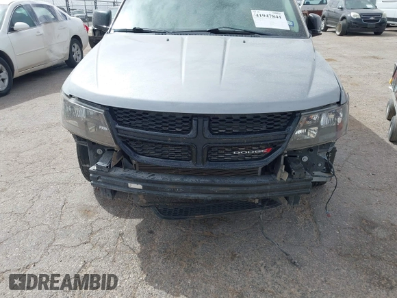 2019 Dodge Journey SE z VIN 3C4PDCBB5KT861358, wystawiony jako IAAI lot #41947841 z przebiegiem 82 099 mil mil oraz . Historia ofert i sprzedaży dostępna na DreamBid. Obrazek 6.