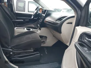 2013 Dodge Grand Caravan SXT with VIN 2C4RDGCG0DR552784, listed as a IAAI auction lot 42116395 with 96,917 mi miles and . Bid and sale history available at DreamBid. Image 5.