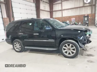 2013 GMC Yukon Denali with VIN 1GKS2EEF0DR105804, listed as a IAAI auction lot 42028402 with 121,054 mi miles. Bid and sale history available at carsss.com. Image 13.