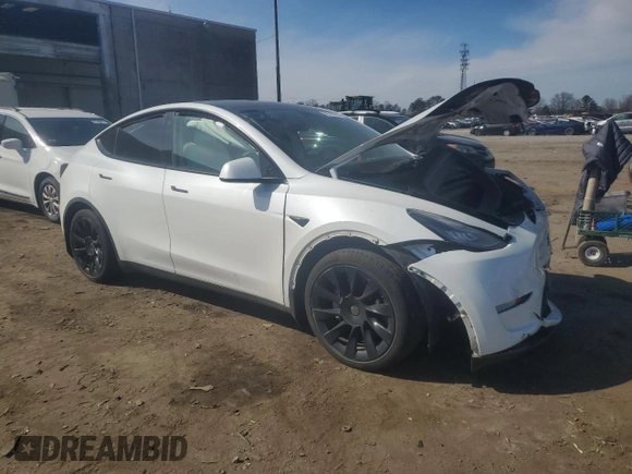 2022 Tesla Model Y Long Range with VIN 7SAYGAEE3NF416838, listed as a Copart auction lot 46157675 with 24,254 mi miles and Salvage Title. Bid and sale history available at DreamBid. Image 4.