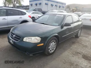 2000 Nissan Maxima GXE z VIN JN1CA31D7YT728277, wystawiony jako Copart lot #54730184 z przebiegiem 131 185 mil mil oraz Czysty tytuł • Clean title. Historia ofert i sprzedaży dostępna na DreamBid. Obrazek 1.