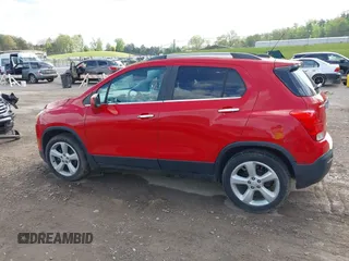 2015 Chevrolet Trax LTZ with VIN 3GNCJTSB6FL213113, listed as a IAAI auction lot 41999668 with 88,361 mi miles. Bid and sale history available at carsss.com. Image 14.