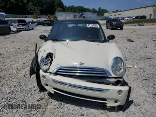 2006 MINI Hardtop с VIN WMWRC33516TK70432, выставлен на аукционе Copart как лот 62157605 с пробегом 139 823 миль миль и Списание • Salvage title. История ставок и продаж доступна на DreamBid. Изображение 5.