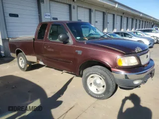 2000 Ford F-150 XL with VIN 1FTRX18W7YNA67100, listed as a Copart auction lot 78982114 with 0 mi miles and Salvage Title. Bid and sale history available at carsss.com. Image 4.