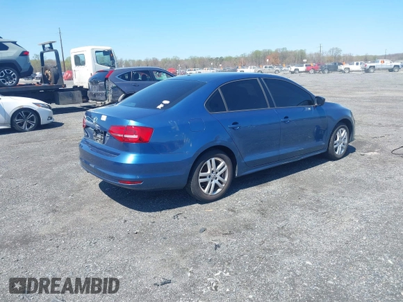 2015 Volkswagen Jetta Sedan 2.0L S with VIN 3VW2K7AJ9FM216984, listed as a IAAI auction lot 41980257 with 139,542 mi miles. Bid and sale history available at carsss.com. Image 4.