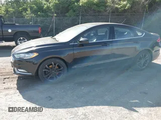 2017 Ford Fusion SE with VIN 3FA6P0HD5HR165895, listed as a IAAI auction lot 42130227 with 85,545 mi miles. Bid and sale history available at carsss.com. Image 2.