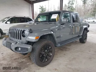 2022 Jeep Gladiator Overland with VIN 1C6HJTFG2NL114648, listed as a IAAI auction lot 41710064 with 62,453 mi miles. Bid and sale history available at carsss.com. Image 2.
