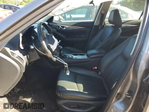 2015 Infiniti Q50 Premium with VIN JN1BV7ARXFM423026, listed as a Copart auction lot 58139225 with 130,544 mi miles and Salvage title. Bid and sale history available at DreamBid. Image 7.