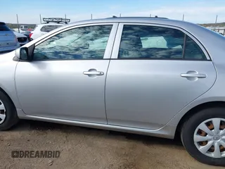 2009 Toyota Corolla with VIN 1NXBU40E39Z092092, listed as a IAAI auction lot 41881741 with 144,309 mi miles. Bid and sale history available at carsss.com. Image 14.