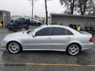 2003 Mercedes-Benz E-Class 5.5L AMG with VIN WDBUF76J93A351317, listed as a IAAI auction lot 41573446 with 144,119 mi miles. Bid and sale history available at carsss.com. Image 14.