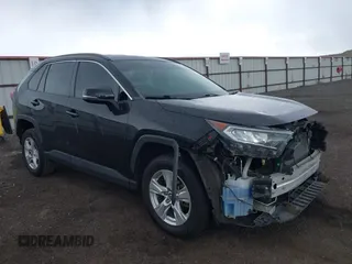 2020 Toyota RAV4 XLE with VIN 2T3P1RFV0LC099939, listed as a IAAI auction lot 42088037 with 83,355 mi miles. Bid and sale history available at carsss.com. Image 1.